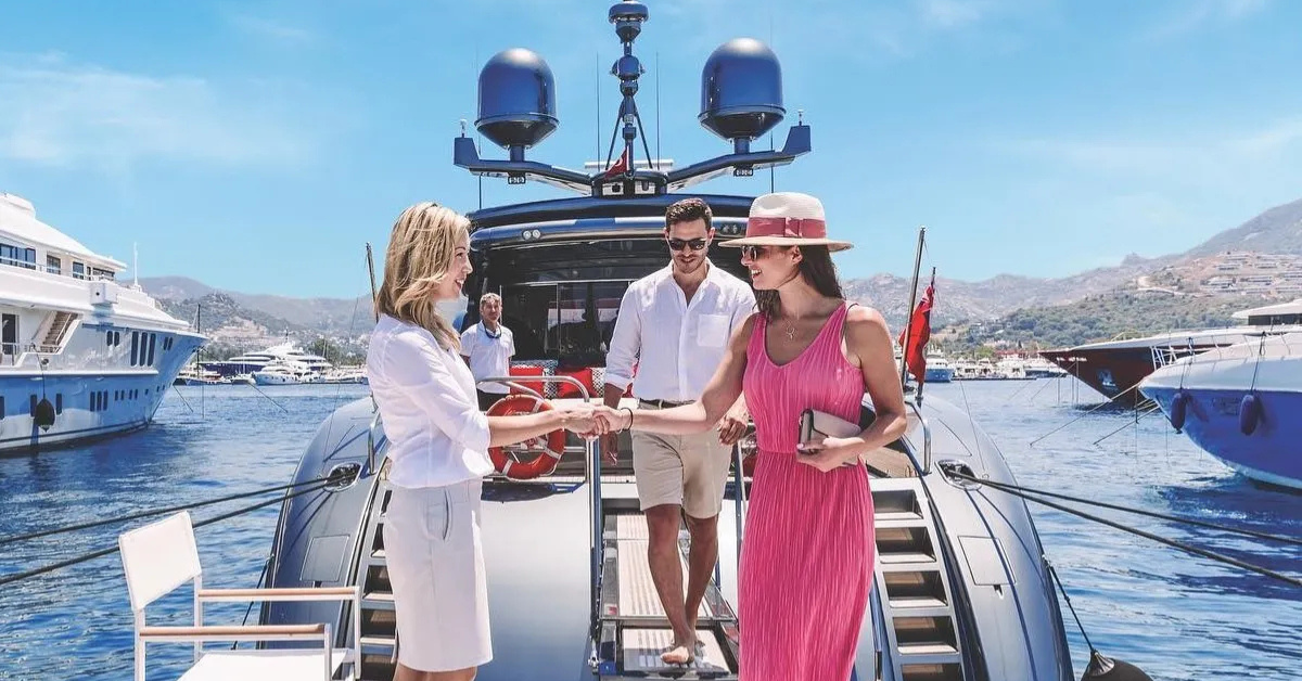 Luxury travelers in Mykonos using a personal concierge service to arrange villas, yachts, VIP tables, private drivers and beach club reservations during summer 2026.